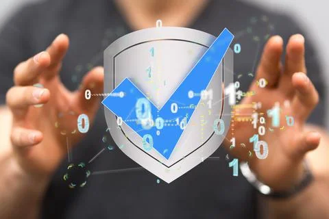 A person presenting the virtual projection of shield check mark icon with bin 写真素材