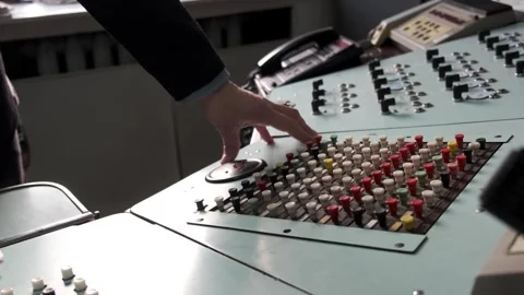 A person is pressing a button on a control panel Stock Footage 329179026