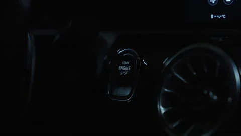 Person pressing car start engine button Stock Footage 345665881