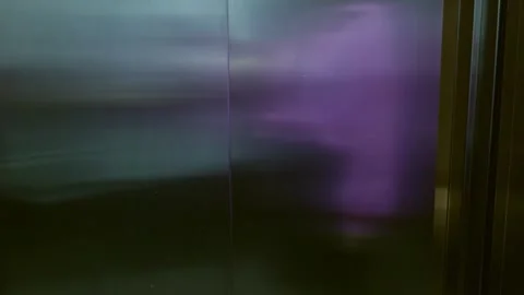 Person pressing elevator button indoors, urban travel Stock Footage 327830425