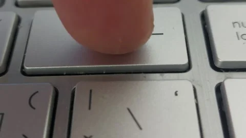 Person Pressing Enter Backspace Key on Laptop Keyboard Close Up Stock Footage 333642112