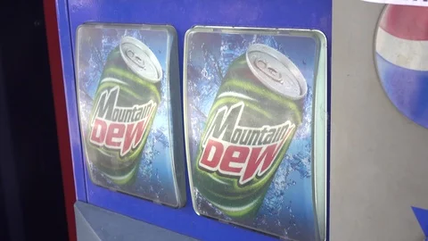 Person pressing Mountain Dew selection at vending machine 4k Video stock 111412269