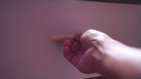 Person pulling wooden handle to shut storage drawer at home. Vidéo 341926319