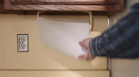 Person Pulls Paper Towel from Roll Fast Stock Footage 61709404