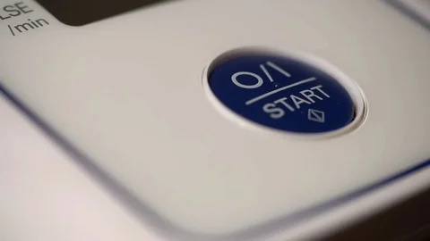 Person pushes the button of the device power Video stock 72161003