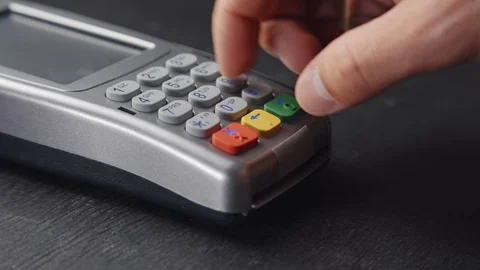 Person pushing the button and swipe credit card payment on pos terminal Stock Footage 82277555