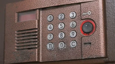 Person pushing buttons on the panel of intercom Stock Footage 69212262