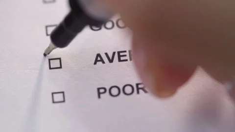 The person puts a check mark in front of the word Average Stock Footage 145630272