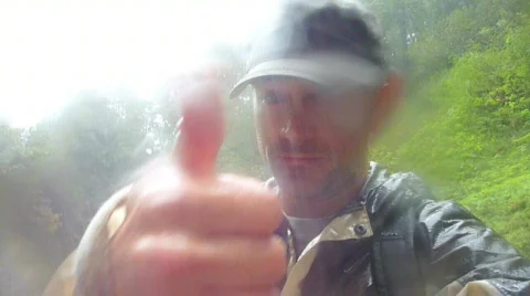 Person in Rain Thumbs Up Stock Footage 874749