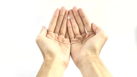 A Person Raises both Hands in Prayer Stock-Footage 296566147