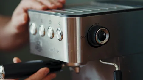 Person Reaching for Espresso Machine Dial to Brew Stock Footage 346638151