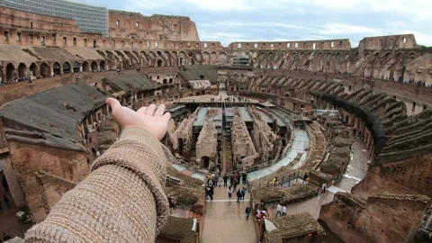A person is reaching out to the camera from the inside of a large building Stock Footage 314994804