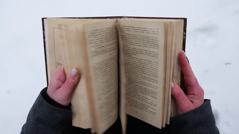 Person reading a book Stock Footage 263920667
