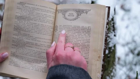 Person reading a book Stock Footage 263920824