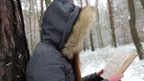 Person reading a book Stock Footage 263921241