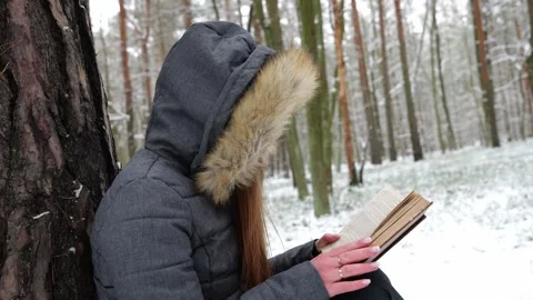 Person reading a book Video stock 263921279