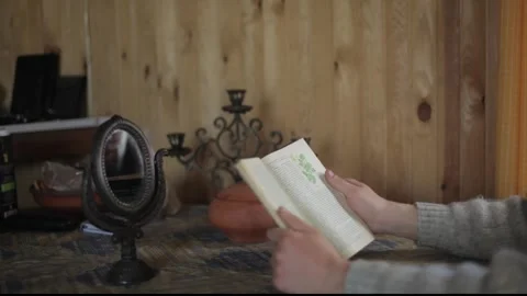 Person reading a book Stock Footage 281485571