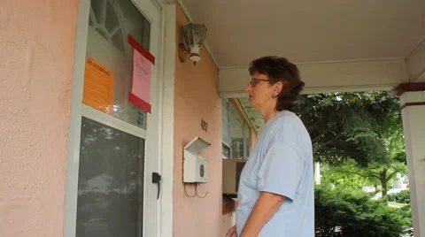 Person reading notice 動画素材 5793231