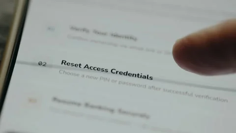 Person reading security measures of 3 steps for a locked account Stock Footage 333383707