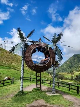 Person relaxing inside nest structure cocora valley Stock Photos