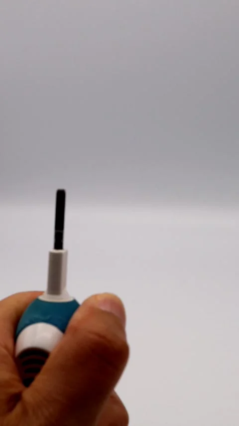 Person replacing an electric toothbrush Video stock 335898913