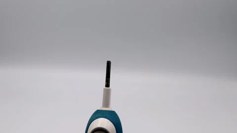 Person replacing an electric toothbrush Stock Footage 335905497