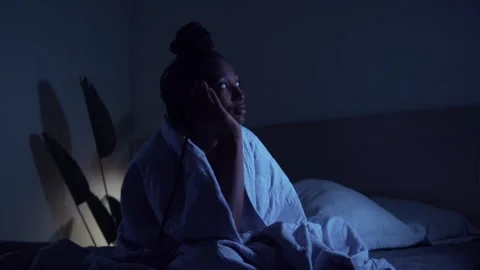 Person with restless mind in a dark room Video stock 332301264