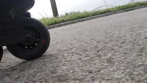 A person riding inline skates on a river shore Stock Footage 239268364
