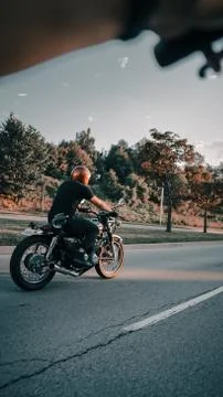 Person riding motorcycle. Stock Photos
