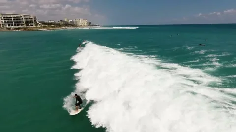 A person riding a wave in the ocean Stock Footage 155458861