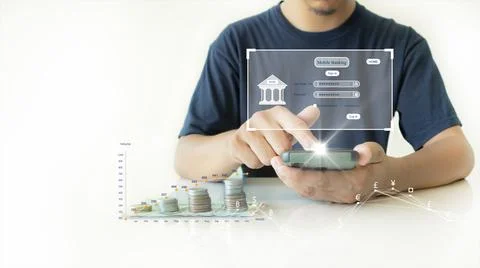The person on the right is using a smartphone to log in to Mobile Banking for Foto stock