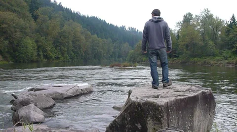 Person at Rocky River Stock Footage 31241875
