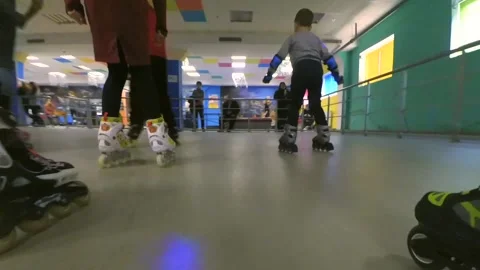 A Person roller-skating on the inside rollerdrom. Point of view Stock Footage 161381304