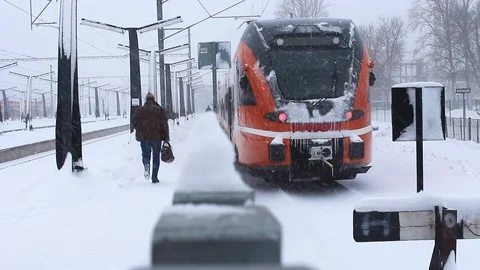 Person running to train in winter Stock Footage 104300245