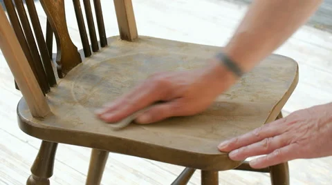 Person Sanding Down Chair Stock Footage 56441295