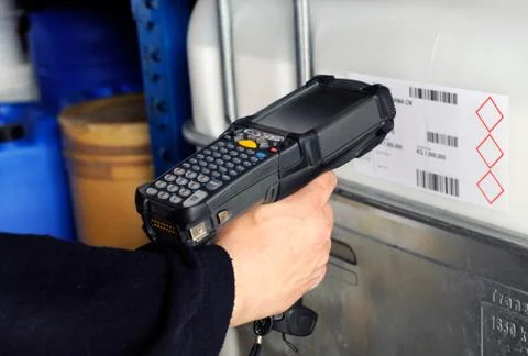 Person scanning barcodes with scanner Stock Photos