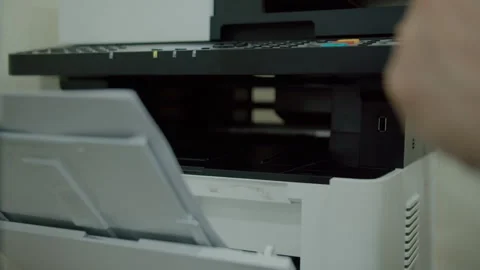 Person scanning documents using office printer scanner Stock Footage 311187210