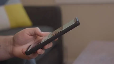 Person scrolling on Phone 4K Stock Footage 243396713