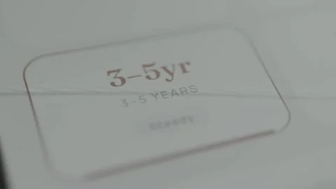 Person selects a 3-5 years timeframe Stock Footage 332492385