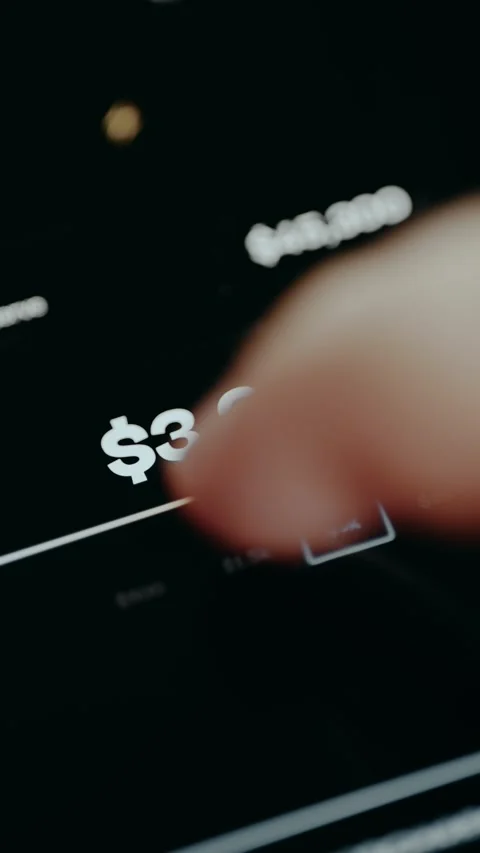 Person selects the desired dollar amount from the app screen Stock Footage 331581999