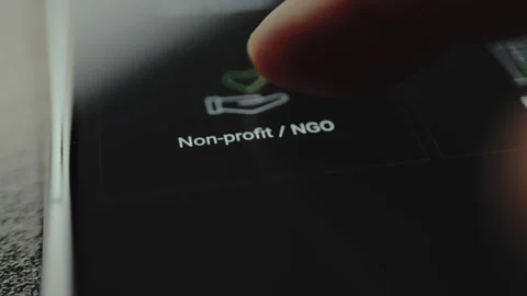 Person selects an option labeled Non profit NGO from a user interface Видео 328376179