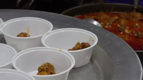 Person Serving Chicken Curry 스톡 동영상 326326243