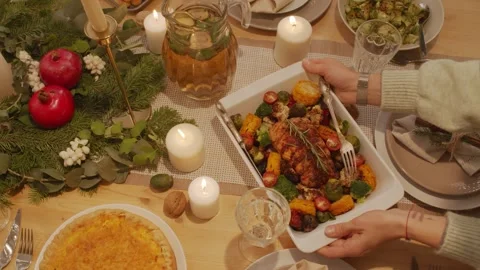 Person Serving Roasted Turkey and Vegetables at Festive Christmas 4K Stock-Footage 332157952