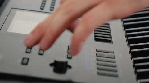 A person sets up a synthesizer Stock Footage 132782019