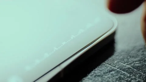 Person is setting the camera exposure on smartphone screen Stock Footage 326946401