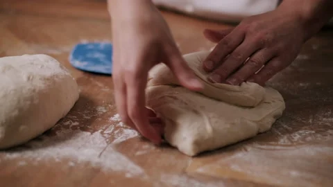 Person shaping bread into a loaf Stock Footage 130383103