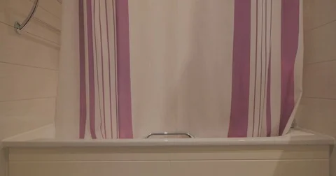 Person showering creating a shadow Stock Footage 81948341