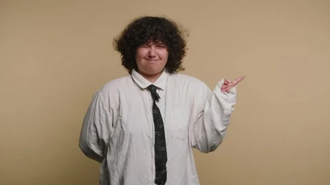 Person shows different expressions and gestures in a studio setting with a .. Vídeo Stock 331990604