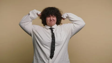 Person shows different expressions while wearing a white shirt and black ti.. 스톡 동영상 331990593