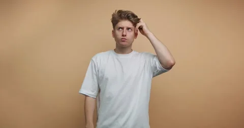Person shows different gestures indicating confusion, thought, and realizat.. 動画素材 328247182